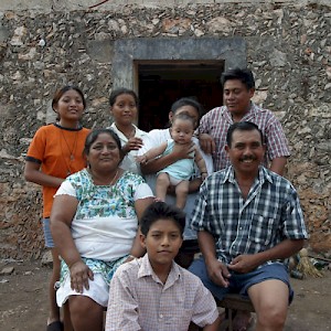 A family of Mayans who live in Oxtapacab, Yucatan. There are three generations living in their thatched home. <a href=></a>