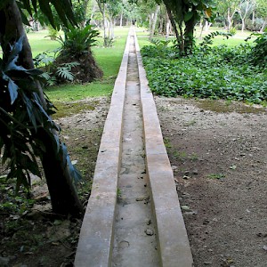 This is an aquaducto or stone waterway used to irrigate the orchards and fields. They were usually fed from a noria or large holding tank constructed of limestone. In restored haciendas the noria is often converted into a swimming pool. <a href=></a>